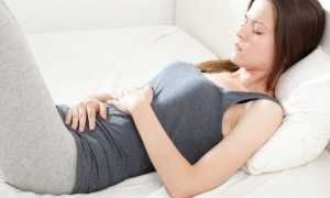 Почему перед месячными болит поясница: причины и что с этим делать